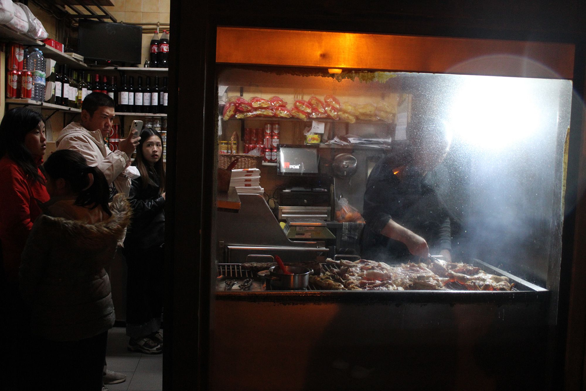 Silva's grilled chicken shop regularly has a queue lined up outside thanks to viral videos showing him in action.