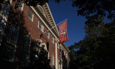 A flag hangs on campus at Harvard University in Cambridge