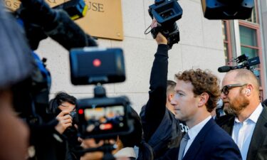 Meta CEO Mark Zuckerberg arrives outside court to testify in a key test case accusing Meta and Google's YouTube of harming kids' mental health through addictive platforms