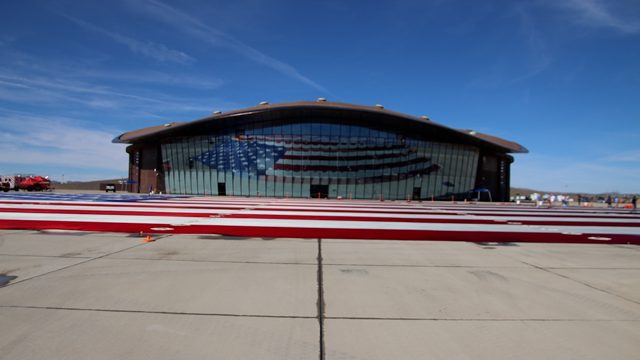 The "Great American Flag" measures slightly under 2 acres at 410'x211' and weighs over 14,000 lbs.