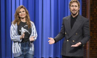 Ryan Gosling (right) brought Eva Mendes (left) onstage during a recording of "The Tonight Show Starring Jimmy Fallon" on Thursday
