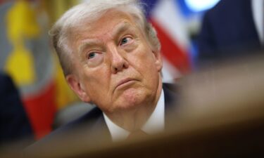 President Donald Trump looks on in the Oval Office of the White House on January 29.