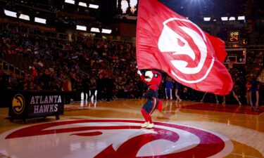 The Atlanta Hawks mascot gets the crowd hyped before a home game at State Farm Arena in 2024.