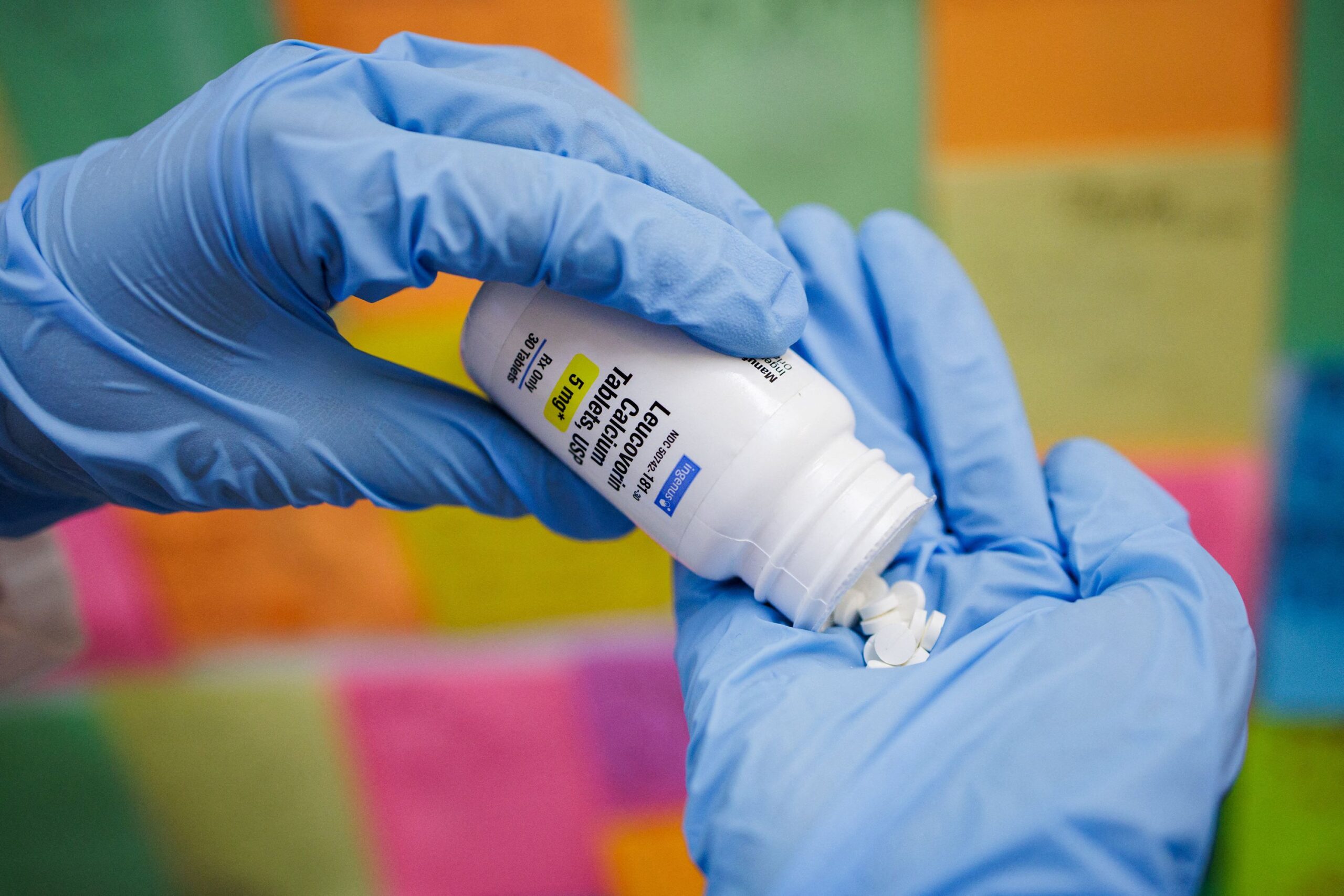 <i>Hannah Beier/Reuters via CNN Newsource</i><br/>A person poses with a bottle of Leucovorin in this illustration picture taken in Schwenksville