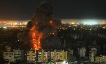 A fireball rises from the site of an Israeli airstrike that targeted an area in Beirut's southern suburbs overnight.