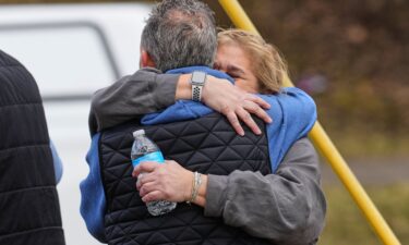 Police block an entrance road after a gunman opened fire at Old Dominion University in Norfolk