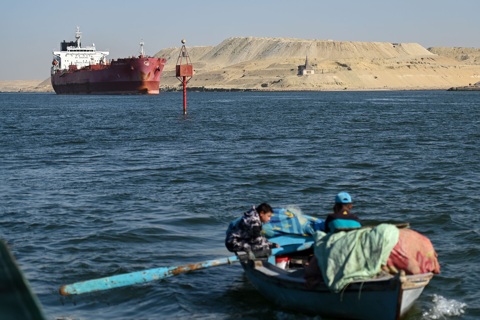 <i>Elke Scholiers/Getty Images via CNN Newsource</i><br/>A bulk carrier sits anchored at a port in Oman earlier this month.