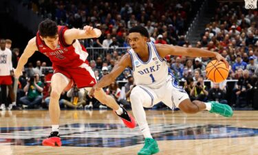 Arizona Wildcats forward Tobe Awaka goes up for two against Arkansas Razorbacks guard Billy Richmond III in the second half during Sweet Sixteen game on Thursday.