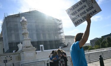 Members of the group "Concerned Women for America" pray outside the US Supreme Court as the Court hears oral arguements in Chiles v. Salazar