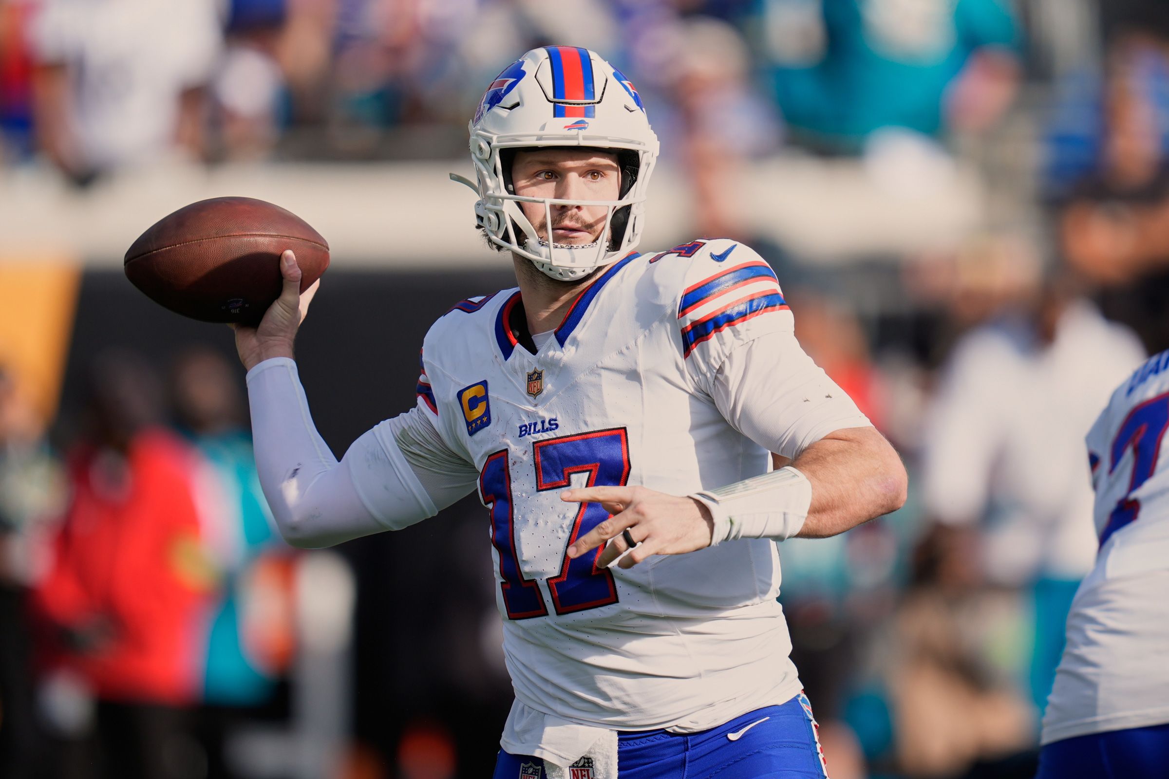 <i>John Raoux/AP via CNN Newsource</i><br/>Buffalo Bills quarterback Josh Allen throws a pass during the second half of an NFL wild card game against the Jacksonville Jaguars on January 11 in Florida.