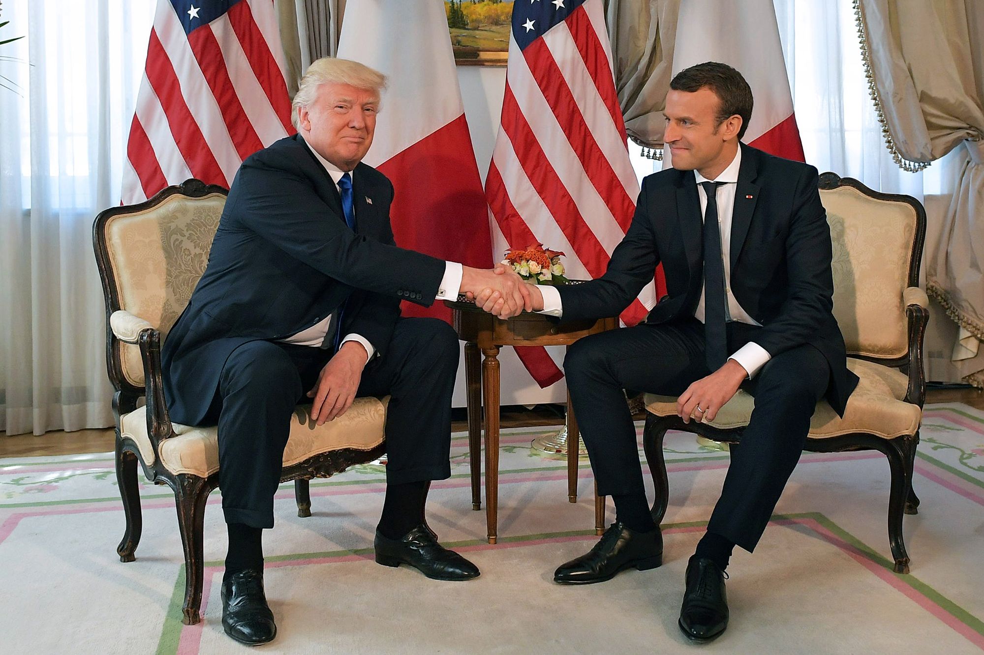 <i>Mandel Ngan/AFP/Getty Images via CNN Newsource</i><br/>US President Donald Trump and French President Emmanuel Macron meet on the sidelines of the NATO summit in Brussels in 2017.