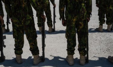 Kenyan members of the Multinational Security Support (MSS) mission in Haiti stand in formation in Port-au-Prince in 2024.