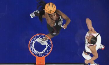 UConn Huskies forward Sarah Strong fights for the ball against South Carolina Gamecocks guard Ta'niya Latson and center Madina Okot in the second half.