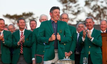 Rory McIlroy wears the famous green jacket after winning the Masters last year.