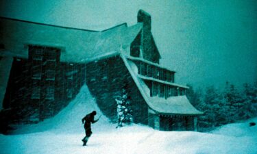 The original five-sided stone fireplace rises three stories high in the main central area of Timberline Lodge.