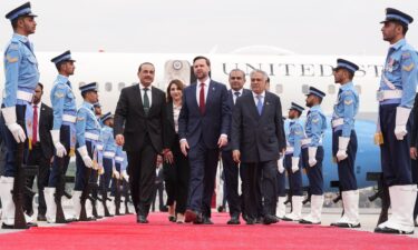President Donald Trump listens to speeches before signing an executive order in the Oval Office of the White House