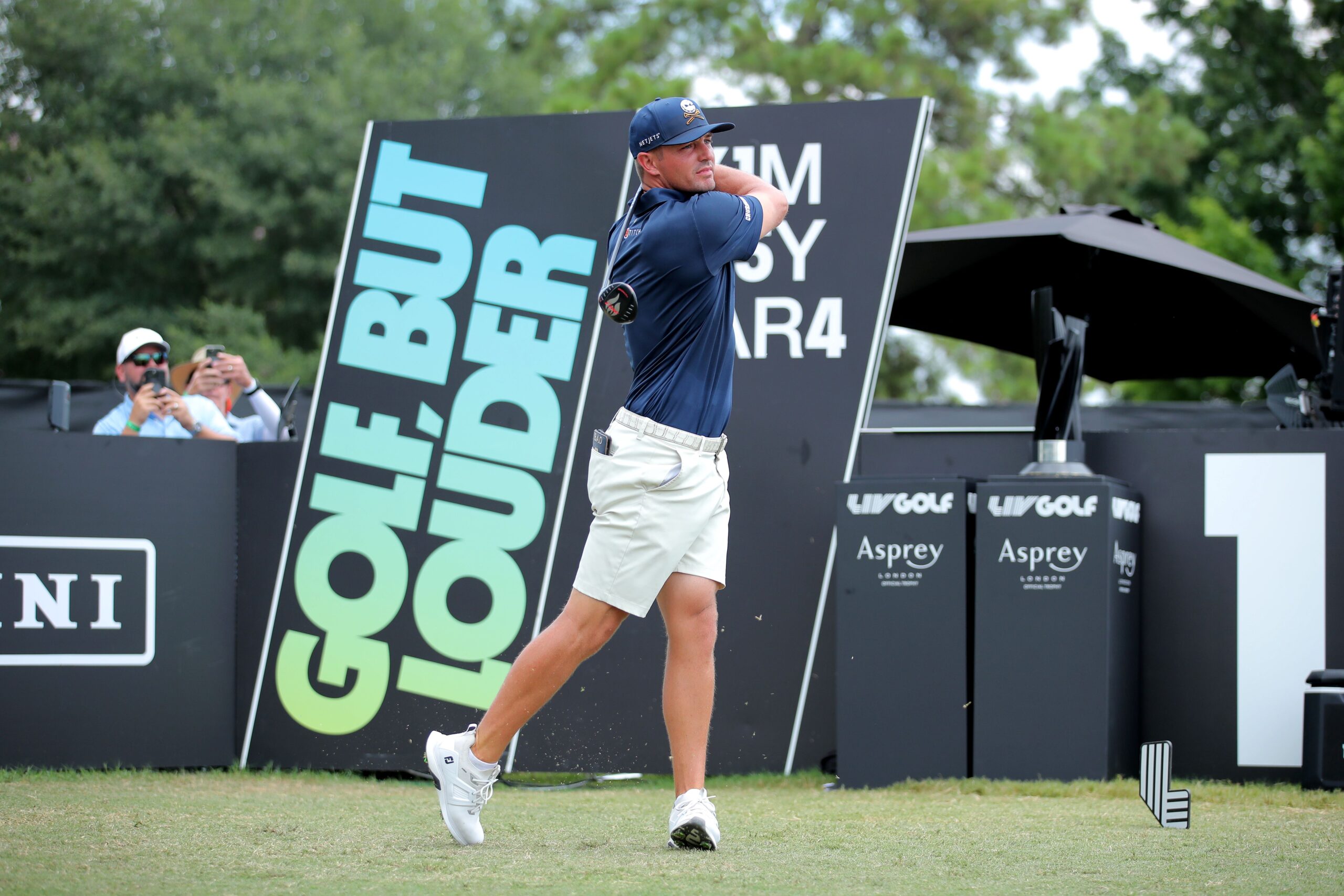 <i>Ben Hsu/Icon Sportswire/AP via CNN Newsource</i><br/>Dustin Johnson reads a green during a LIV Golf event in Illinois in 2023.
