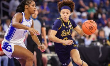 Devin Askew of the Villanova Wildcats goes for a layup against Utah State during the NCAA Basketball Tournament in March.