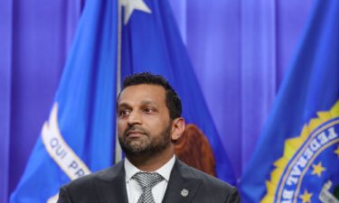 Federal Bureau of Investigation Director Kash Patel listens at a news conference in Washington