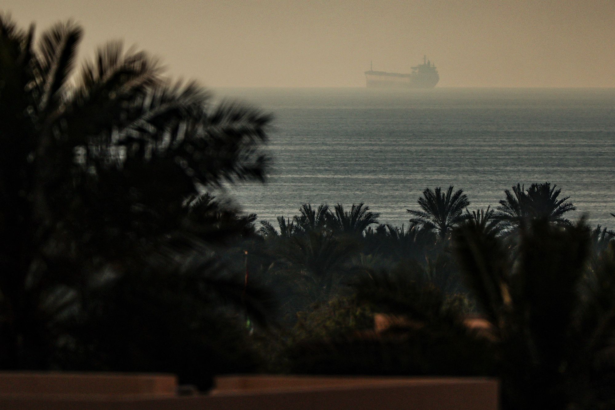 <i>Fadel Senna/AFP/Getty Images via CNN Newsource</i><br/>A photograph taken from the town of Al Jeer in the northern emirate of Ras Al Khaimah shows a tanker passing through the waters of the Strait of Hormuz on February 25.