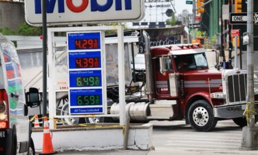 Fuel prices are displayed at a Brooklyn gas station on April 28