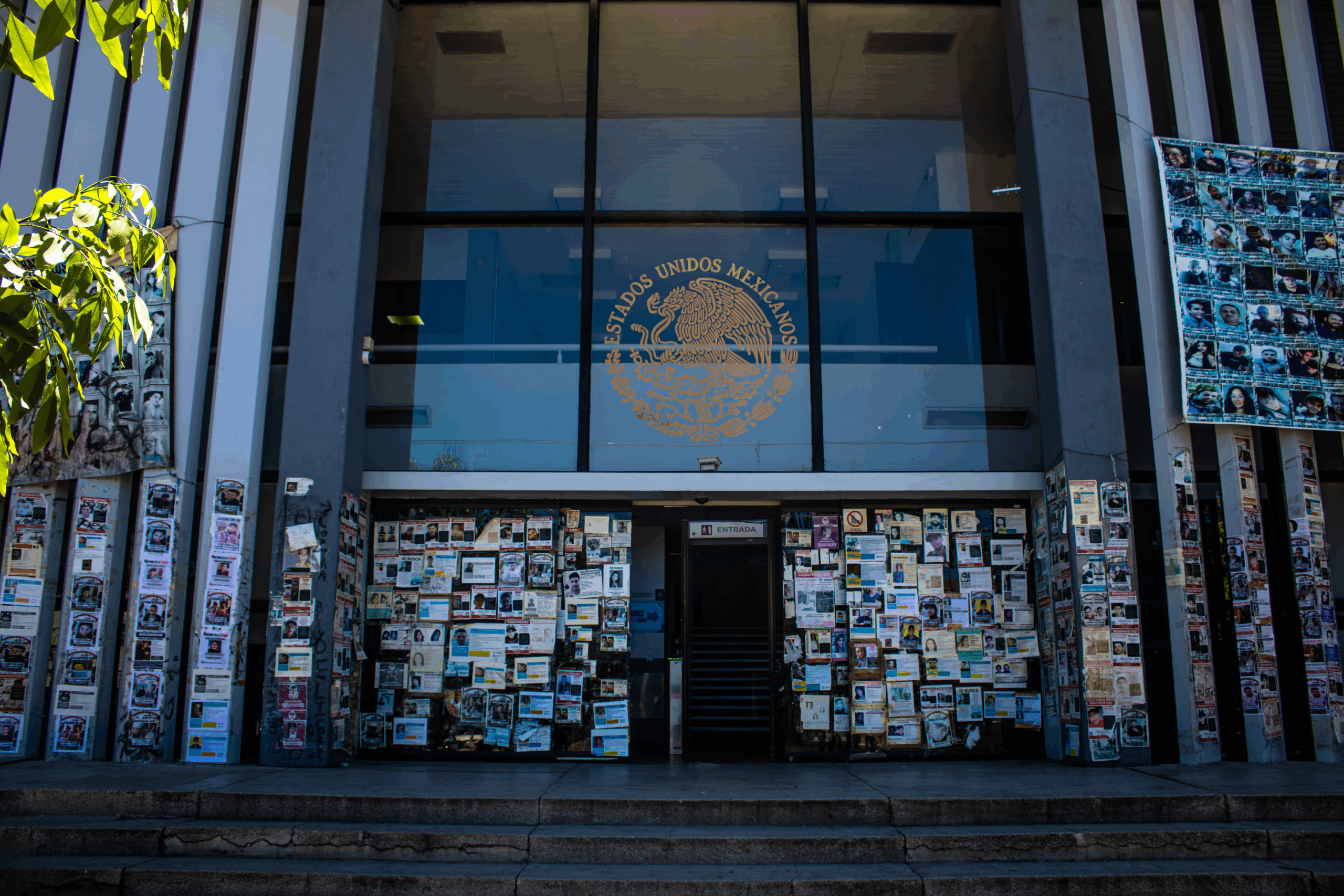 Missing persons search posters cover the facade of the Specialized Prosecutor’s Office for Missing Persons in Guadalajara, Jalisco.