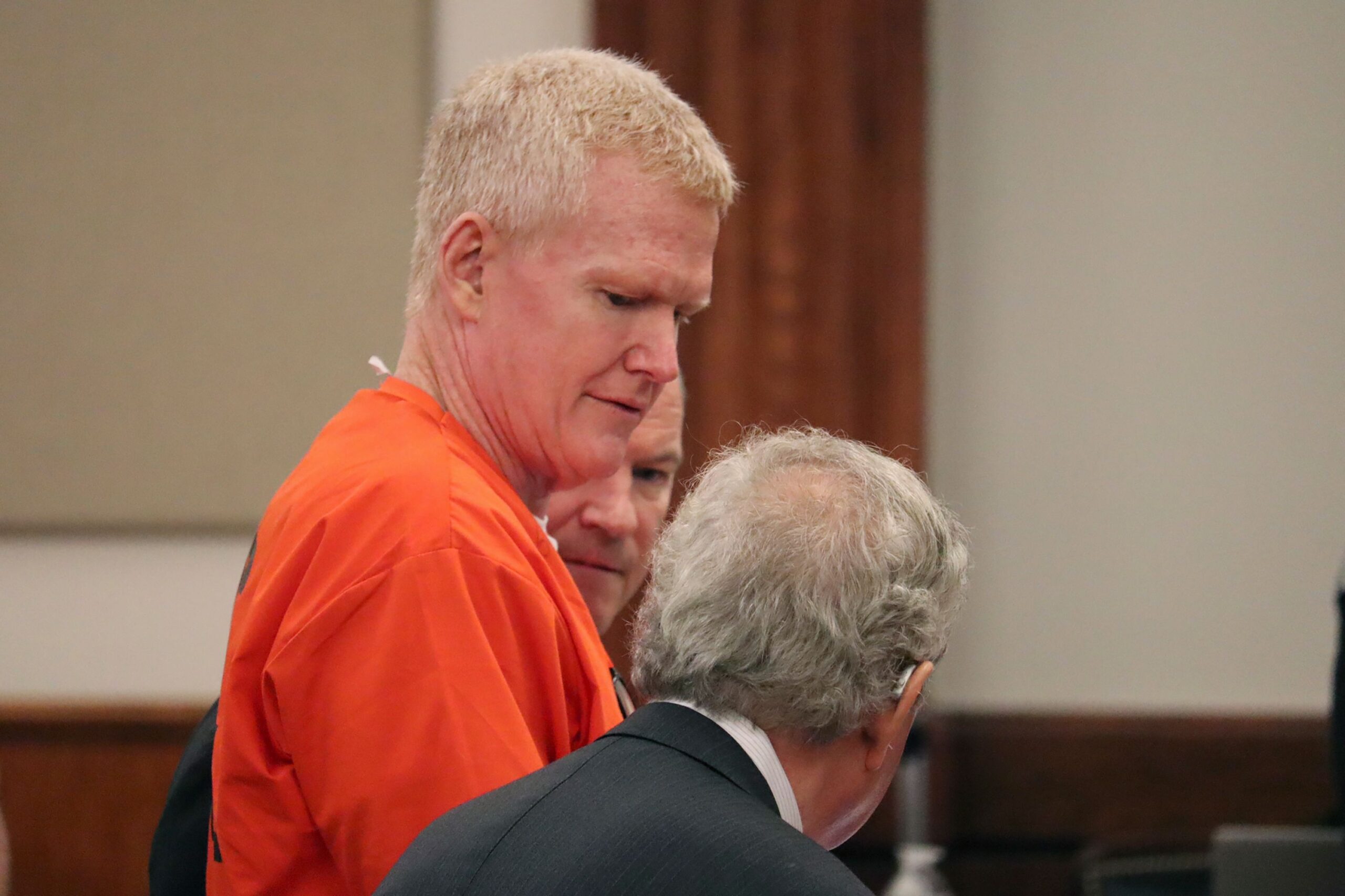 <i>James Pollard/AP via CNN Newsource</i><br/>Alex Murdaugh speaks with his defense attorney on Friday