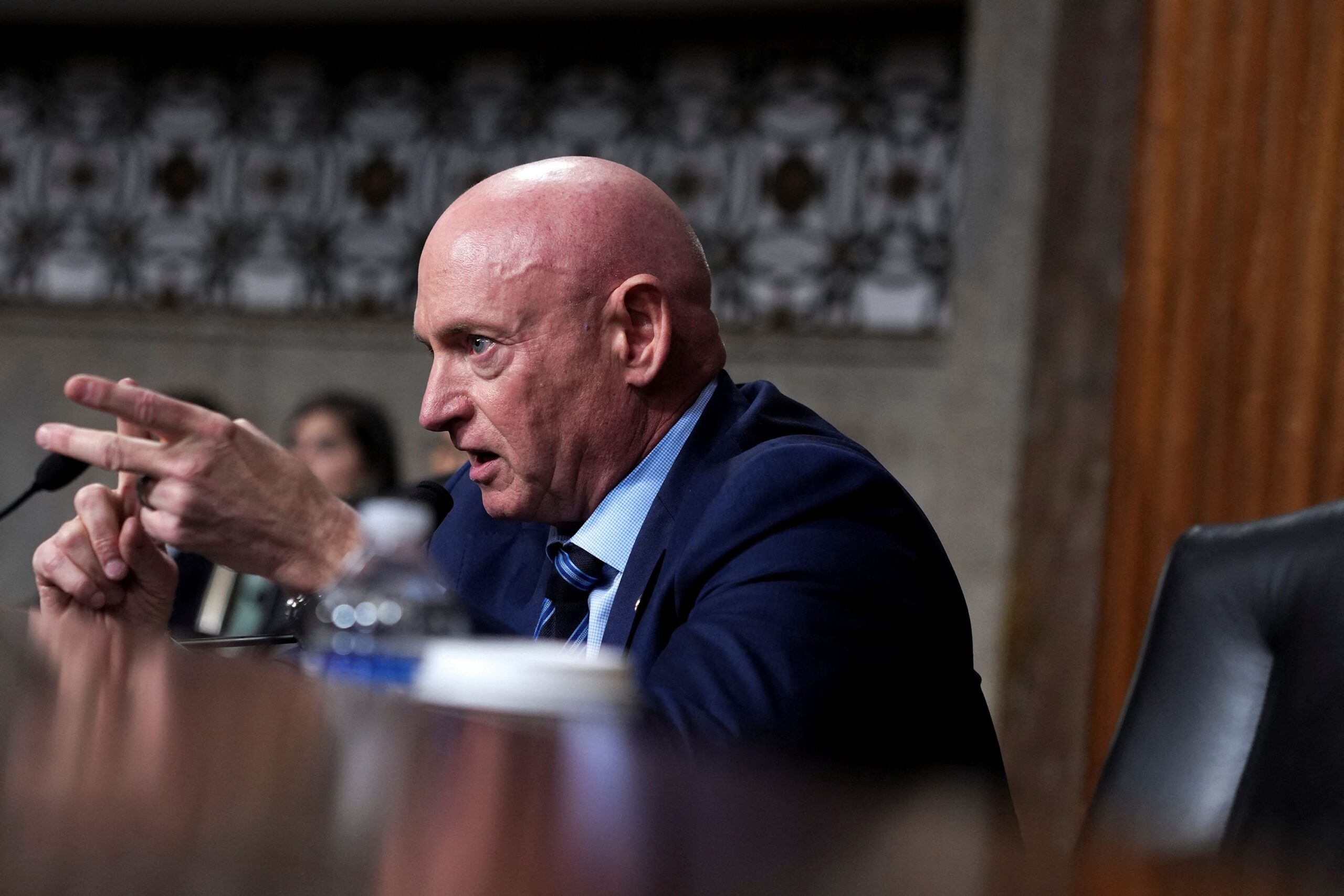 <i>Ken Cedeno/Reuters via CNN Newsource</i><br/>U.S. Senator Mark Kelly (D-AZ) speaks during a Senate Armed Services Committee hearing on April 30