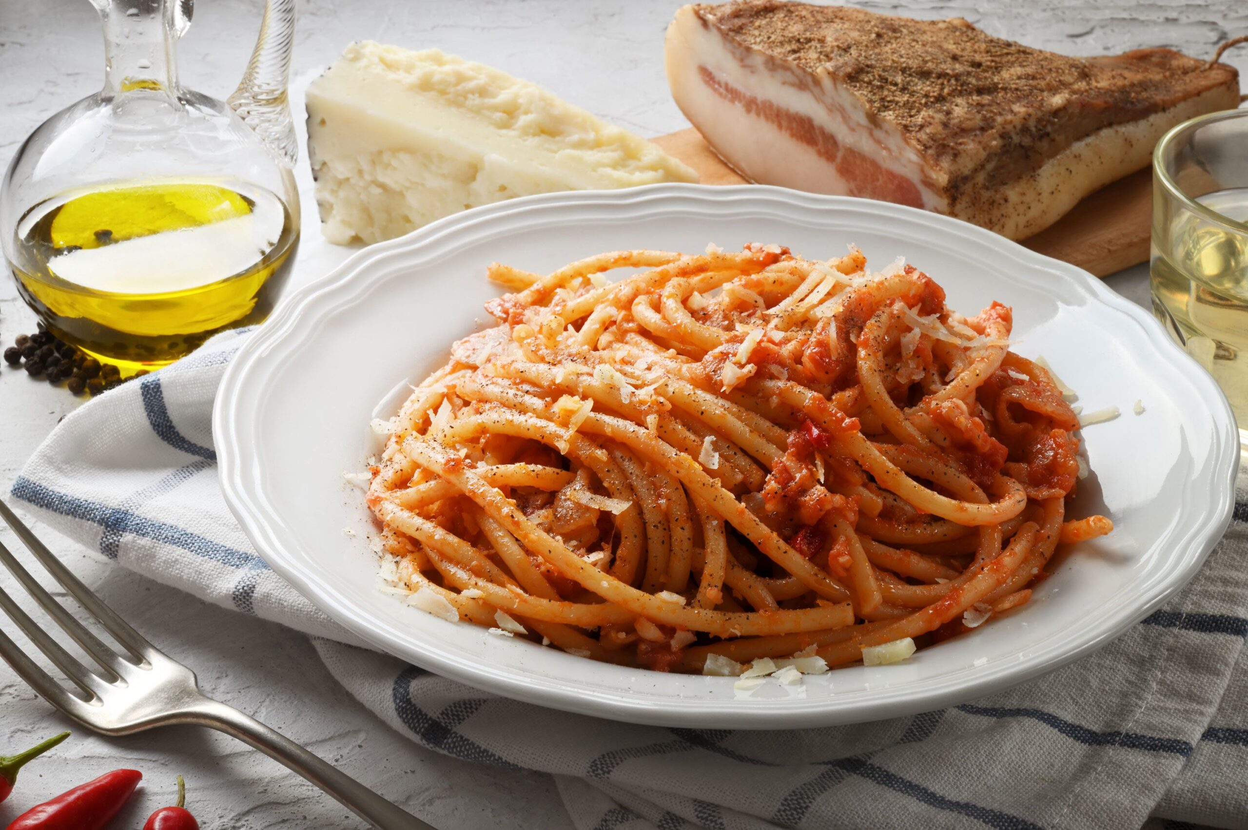 <i>fabiomax/iStockphoto/Getty Images via CNN Newsource</i><br/>Five-ingredient Bucatini all'Amatriciana can be a perfect dinner for one.