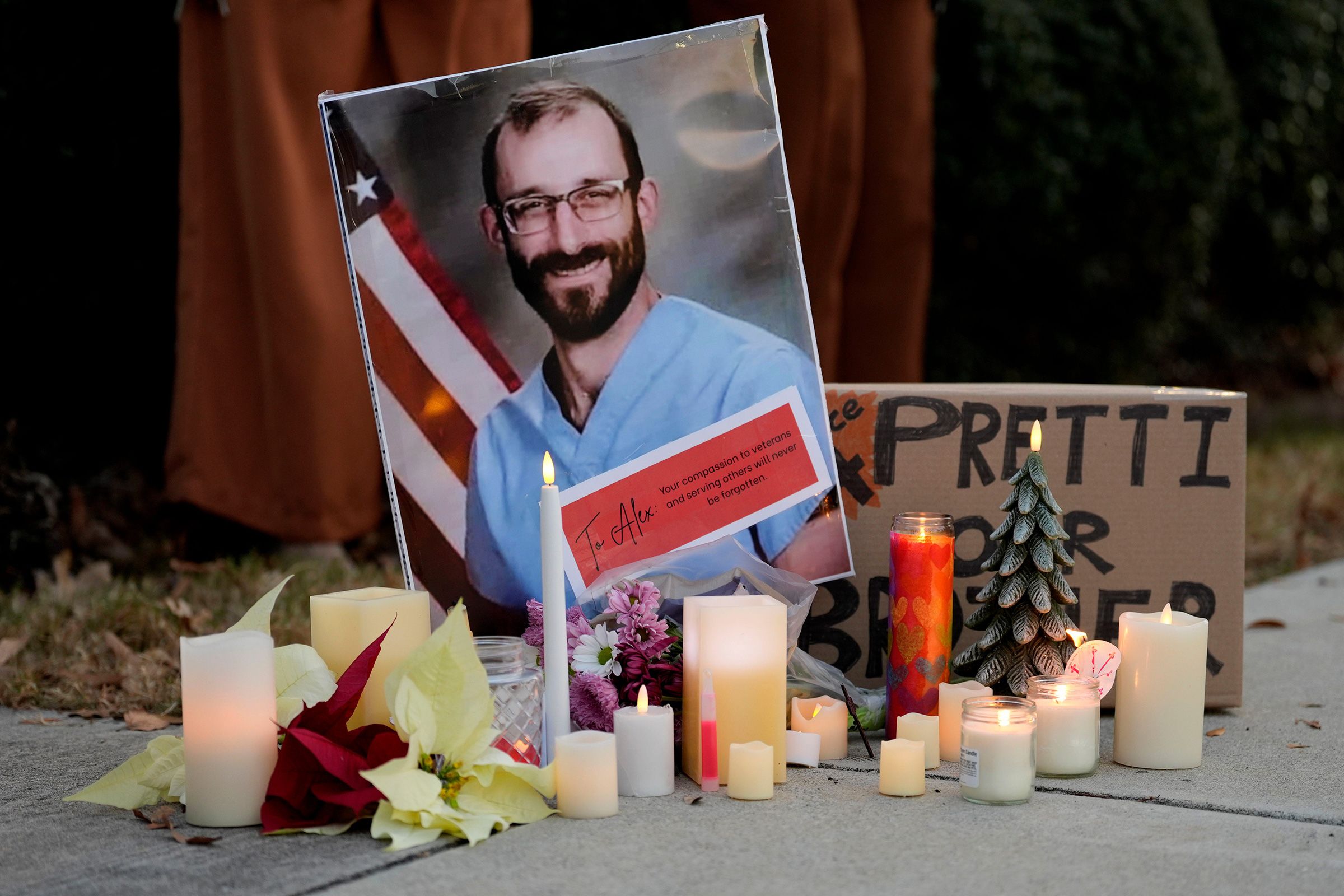 <i>Katie Goodale/Augusta Chronicle/USA Today Network/Imagn via CNN Newsource</i><br/>Becky Halioua holds a candle during a candlelight vigil for Alex Pretti
