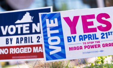 Signs are seen outside Fairfax Government Center during the Virginia redistricting referendum on April 21 in Fairfax