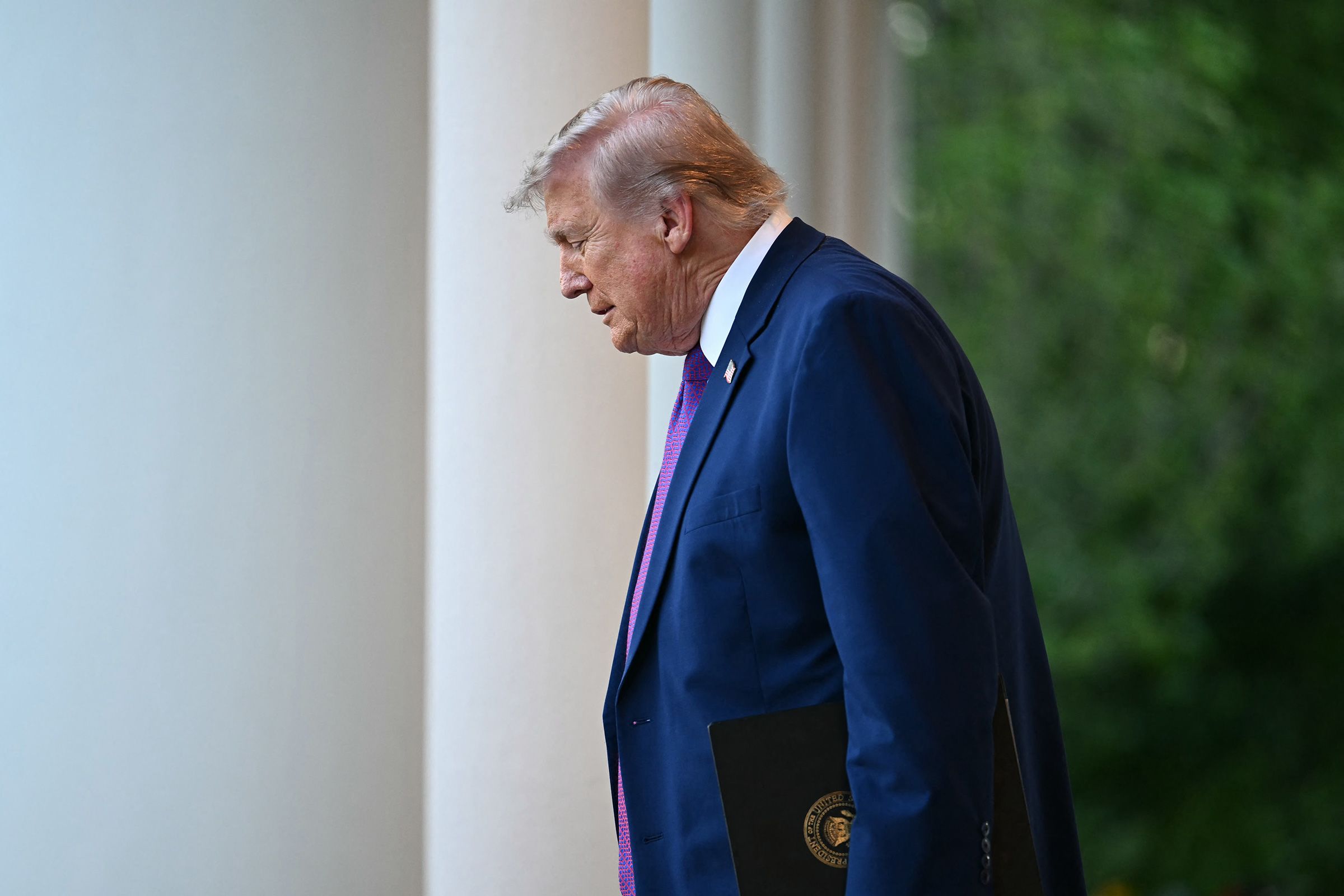 <i>Kent Nishimura/AFP/Getty Images via CNN Newsource</i><br/>President Donald Trump arrives for a "Rose Garden Club" dinner at the White House in Washington