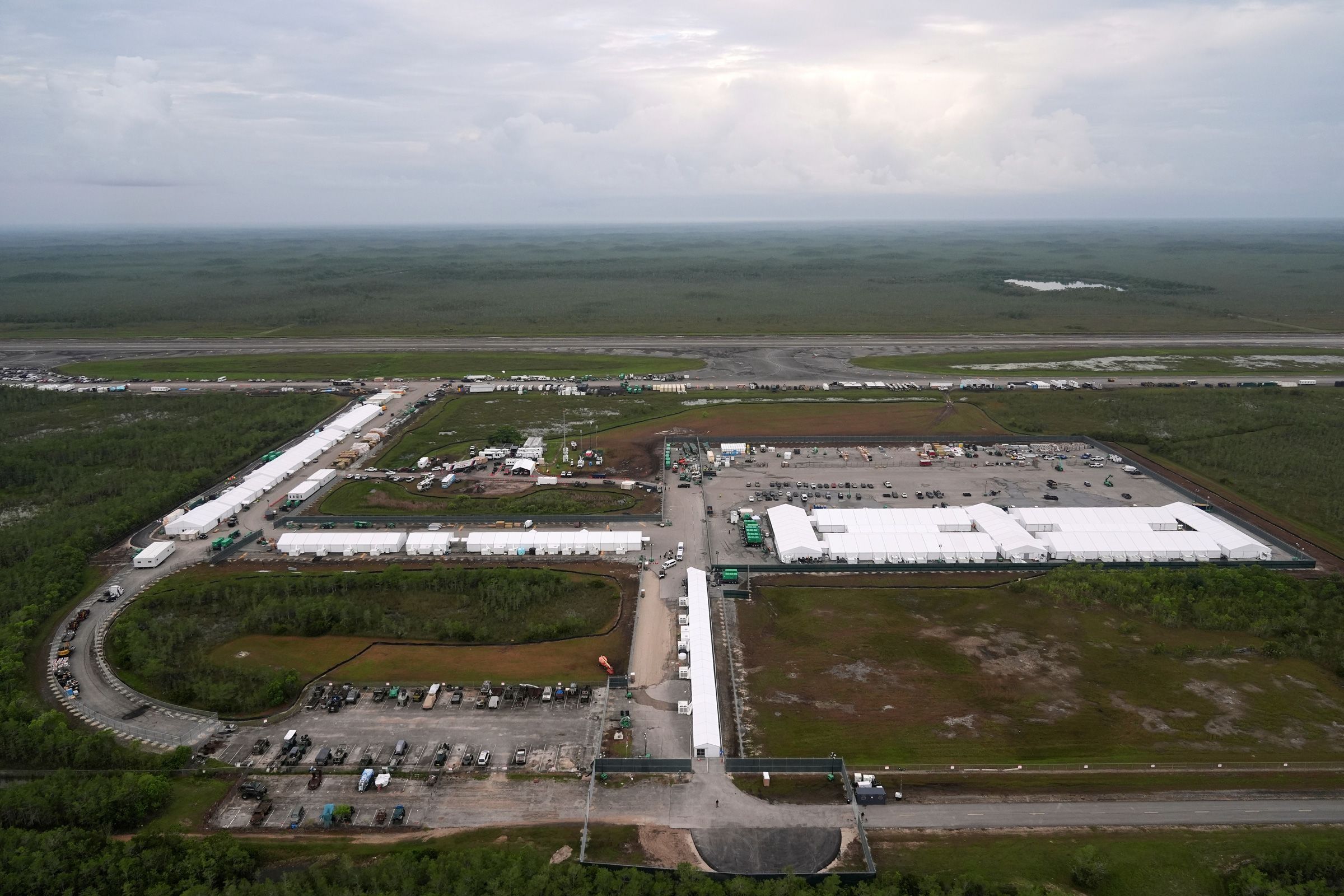 <i>Rebecca Blackwell/AP/File via CNN Newsource</i><br/>Work progresses on a new migrant detention facility dubbed "Alligator Alcatraz
