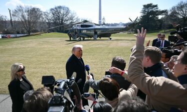 President Donald Trump speaks to the press before boarding Marine One as he departs from the South Lawn of the White House on February 27.