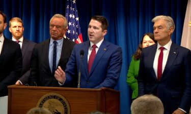 Assistant Attorney General Colin McDonald speaks alongside Secretary of Health and Human Services Robert F. Kennedy Jr. and Centers for Medicare & Medicaid Services administrator Dr. Mehmet Oz during a news conference on fraud in Minnesota on May 21.