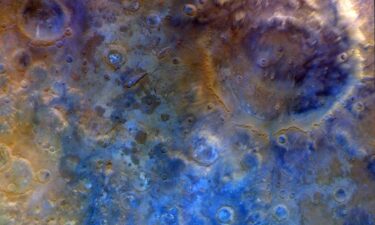 Psyche’s first view of a nearly full Mars extends from the south polar cap northward to the Valles Marineris canyon system.