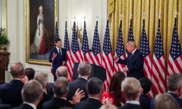 Incoming Federal Reserve Chair Kevin Warsh stands in the East Room during his swearing-in ceremony