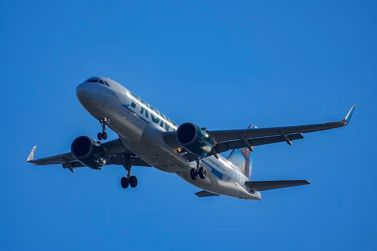 FILE PHOTO: A Frontier Airlines plane approaches Ronald Reagan Washington National Airport near Alexandria, Virginia, U.S., December 24, 2025.