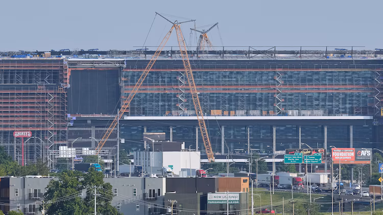 Construction continues on a new enclosed stadium for the Tennessee Titans NFL football team, May 18, 2026, in Nashville, Tenn.
