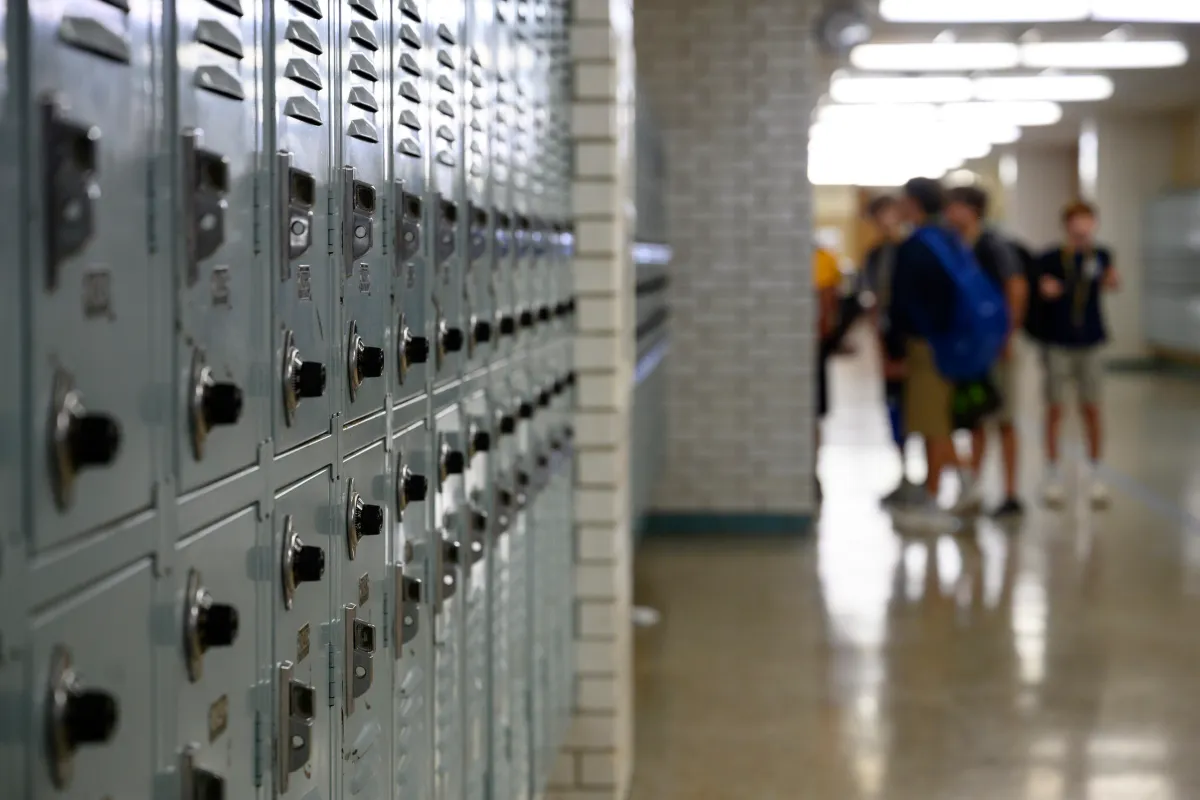 Students gather in the hallway outside of a classroom as they wait for a teacher between periods Wednesday, Sept. 13, 2023, in Odessa. 