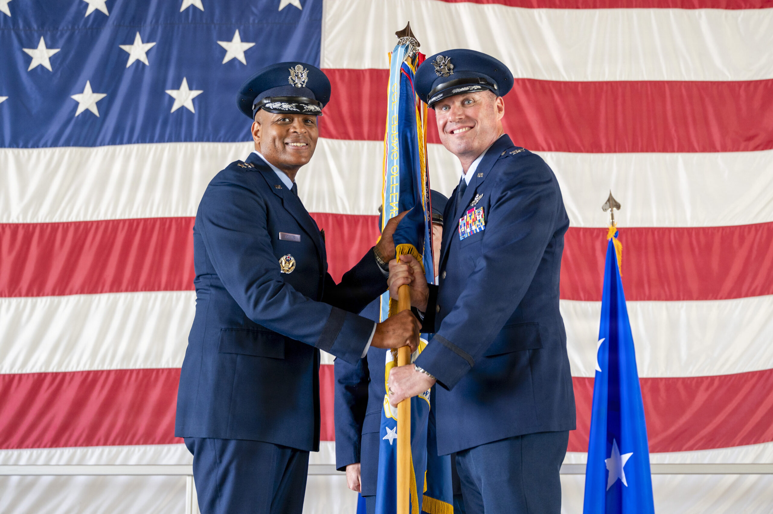 U.S. Air Force Col. Michael Mullin, right, assumes command of the 49th Wing, from Maj. Gen. Roy W. Collins, Air Education and Training Command deputy commander, during a change of command ceremony at Holloman Air Force Base, New Mexico, June 4, 2026. The change of command ceremony is an American military tradition deeply rooted in history, signifying the authority of the incoming commander. 
