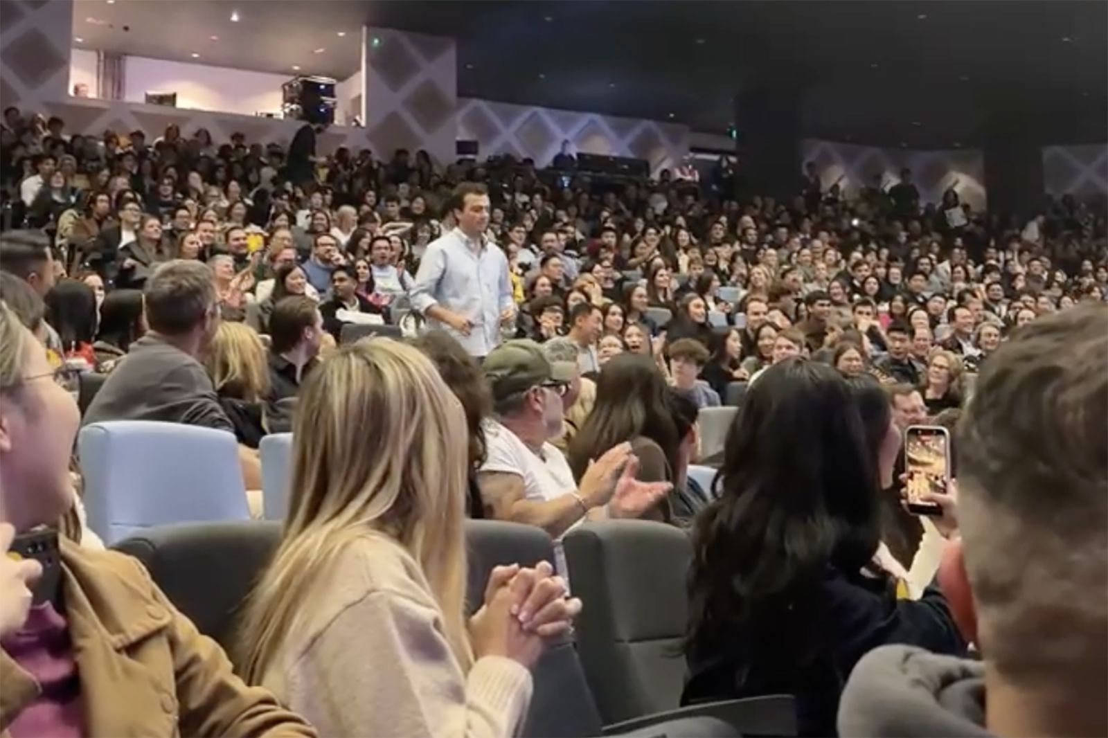 <i>Maddie Corwin via CNN Newsource</i><br/>Audience member Maddie Corwin captured the moment student Sterling Nasa took to the stage.