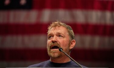 Graham Platner speaks at an event in Orono