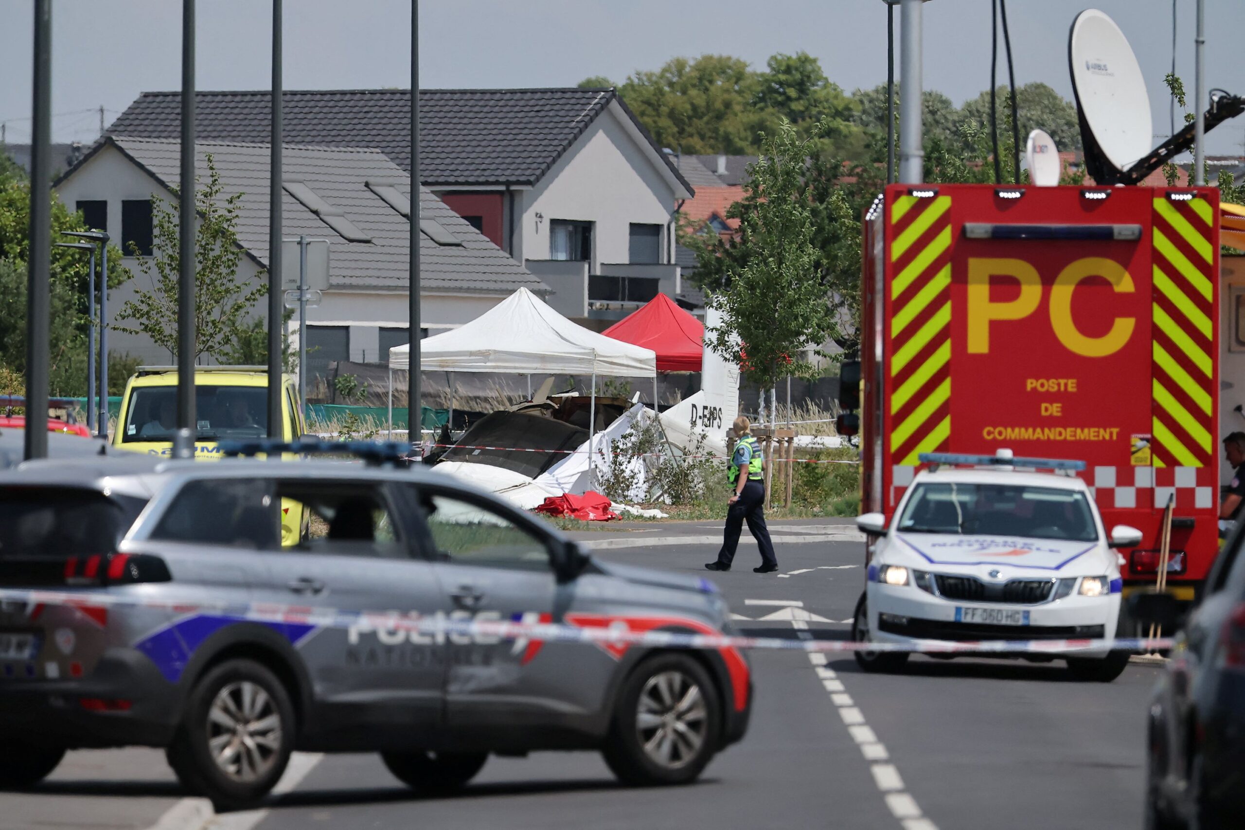 <i>Christian Hartmann/Reuters via CNN Newsource</i><br/>A rescuer works at the site of a plane crash in Tomblaine