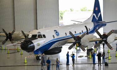 A NOAA WP-3D Orion Hurricane Hunter research plane is shown at the NOAA Aircraft Operations Center in Lakeland