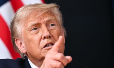 US President Donald Trump reacts and gestures during a bilateral meeting with India's Prime Minister as part of the G7 summit