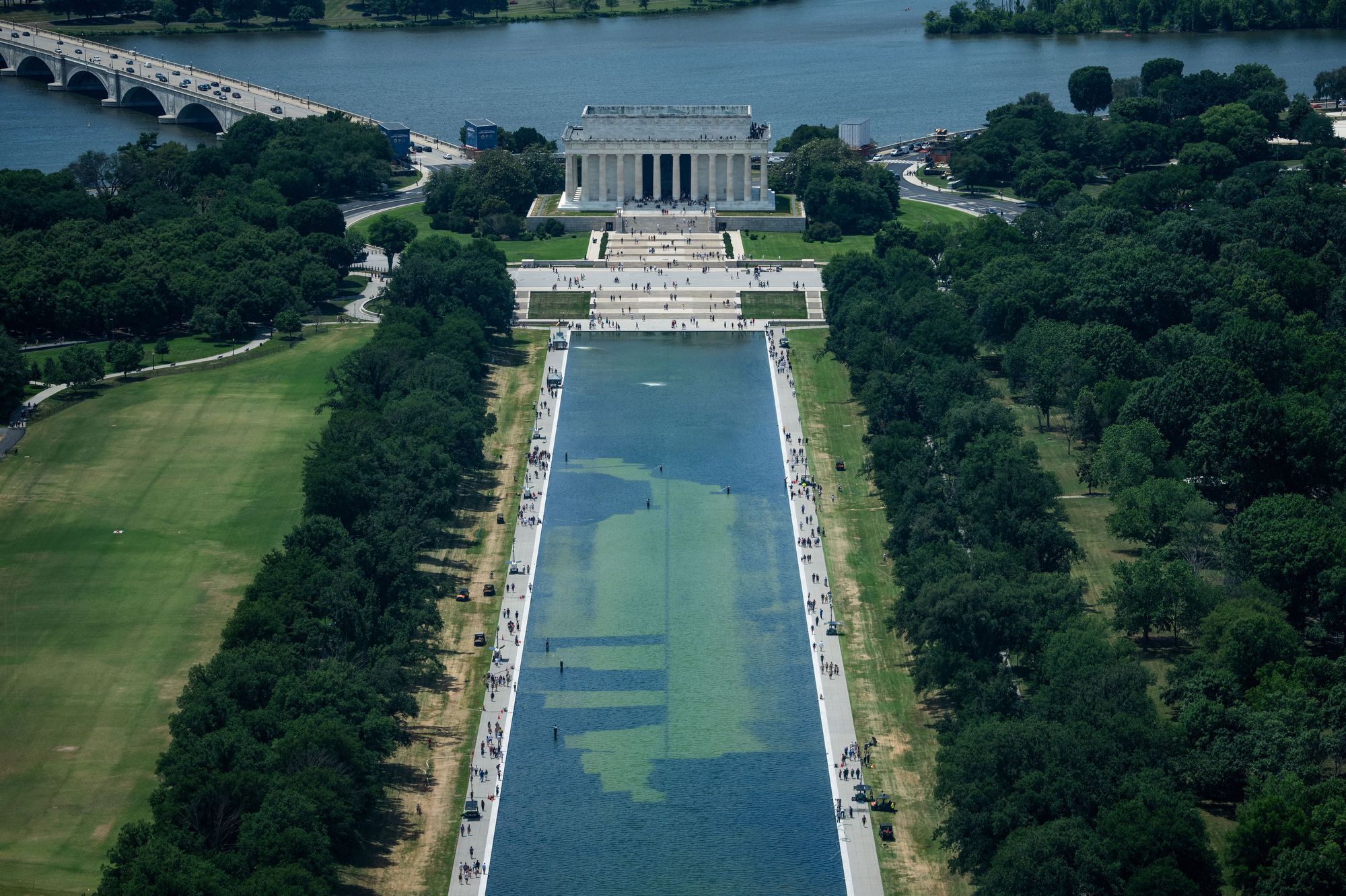 <i>Aaron Schwartz/Reuters via CNN Newsource</i><br/>Chipped paint and algae are visible in the Lincoln Memorial Reflecting Pool