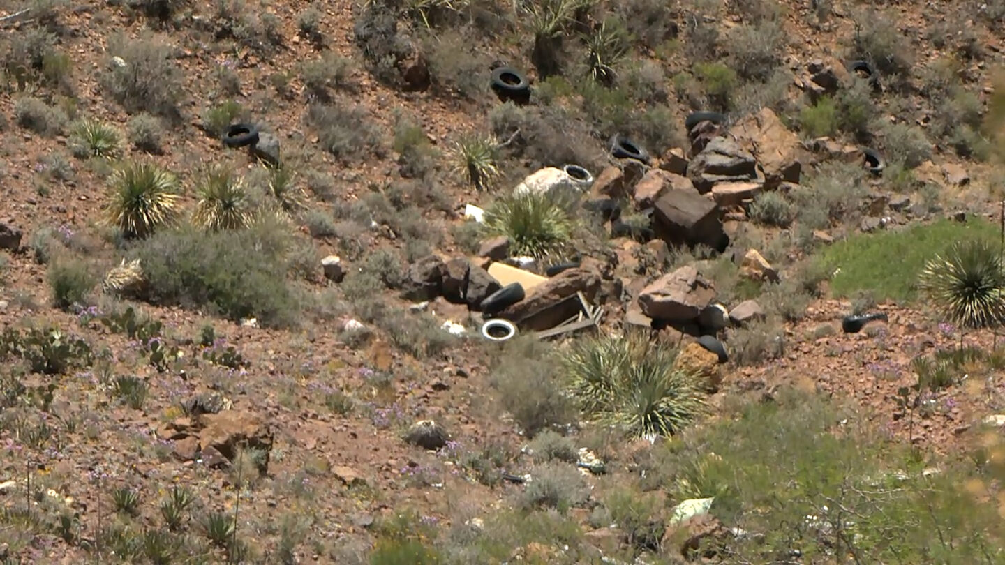 Tires dumped along westside of Transmountain Road, February 2025. 