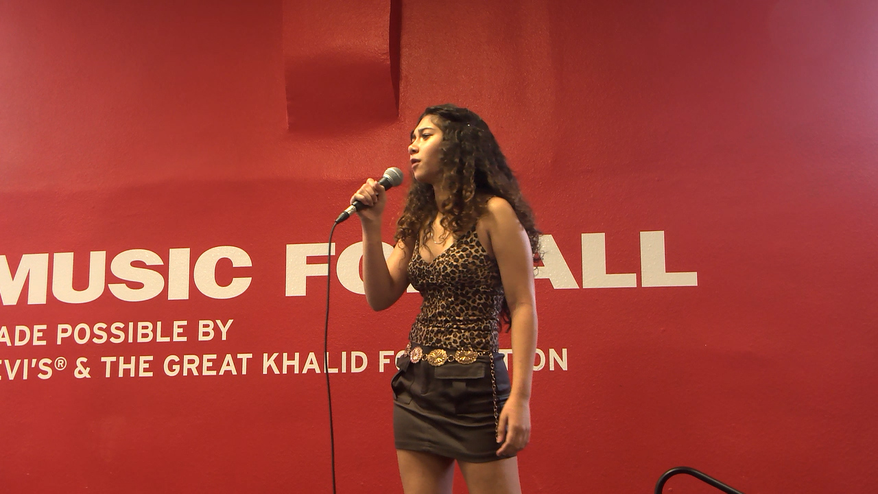 Young singer rehearsing at the Boys and Girls Clubs of El Paso