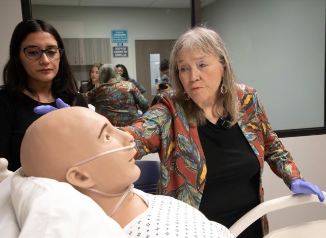 Dr. Kristyna Hartse Guiding Students through a patient checklist. 